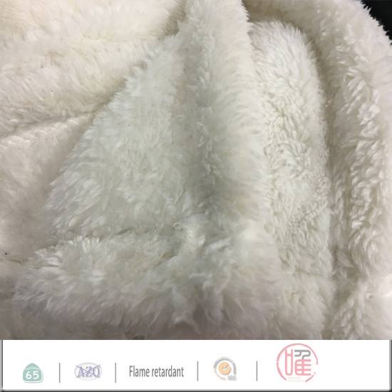 Double side faux fur throw