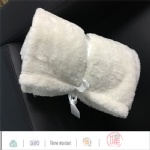 Double side faux fur throw